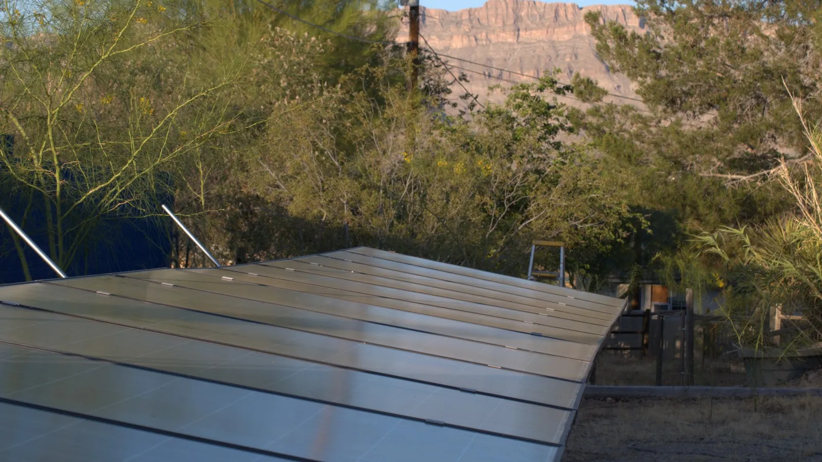 June 2024 In June the panels are nearly flat at 8 degrees. Notice the cliffs showing sunset colors.